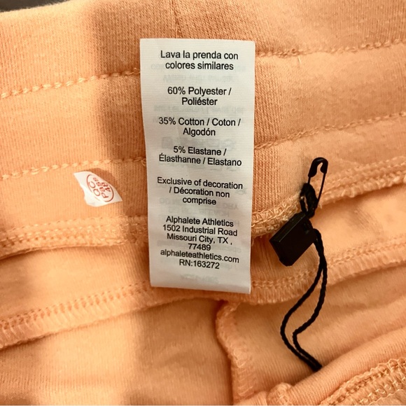 Alphalete NWPT L & S Essential Core women’s athletic shorts light orange - Picture 9 of 13